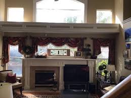 fireplace w surrounding windows