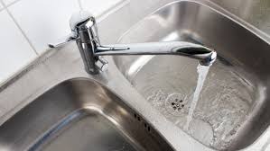 how to clean kitchen sink showerhead