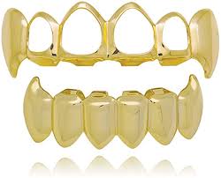 We have occasionally made 22k gold teeth in the past, but we tend to stay away from making grillz in 24k gold because it is too pure and the piece will be malleable and will lose its shape too easily. Amazon Com 4 Open Face Grillz Teeth 18k Gold Grillz Plated Caps Fit Top Bottom Grill Set For Men And Women Jewelry