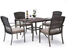 For this type of set, consider factors like ease of use, how easily do the chairs pull in and out, how comfortable are the chairs to sit in and how easy will it be to clean spills and drips off of the table. Amazon Com Pamapic 5 Piece Patio Dining Set Outdoor Dining Table Set Patio Wicker Furniture Set With Square Plastic Wood Table Top And Washable Cushions For Patio Garden Poolside Beige Patio Lawn Garden