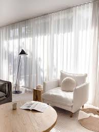 how to curtains for wide windows