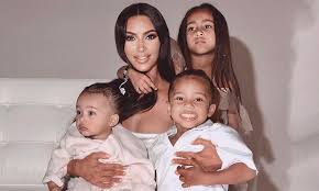 Kim kardashian took to instagram on friday to post the adorable snap featuring kanye west, daughter north, 6, son saint, 4, daughter chicago, one and son psalm, seven months. Kim Kardashian Photoshopped Daughter North West On Christmas Card