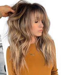 Long blonde hairstyles have always been associated with femininity, grace and elegance. 60 Lovely Long Shag Haircuts For Effortless Stylish Looks Long Shag Haircut Medium Hair Styles Haircuts For Long Hair Long Shag Haircut Hair Styles Long Straight Hair