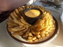 Why does a bloomin onion have so many calories?