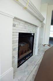 Fireplace With Marble Subway Tile