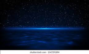 blue light beam dark on water stock