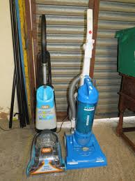 a hoover whirlwind vacuum cleaner and a