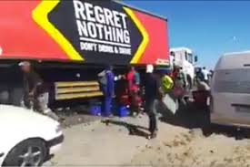 Riots and looting in cape town as africa suffers 1,000 coronavirus deaths. Watch Another Sab Truck Looted This Time Between Stellenbosch And Cape Town The Citizen