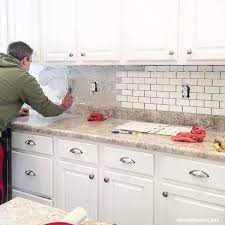 Install tiles for the backsplash. How To Install A Kitchen Backsplash The Best And Easiest Tutorial Kitchen Remodel Home Kitchens Diy Kitchen