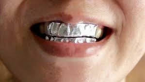 Looking to whiten your teeth at the comfort of your home? How To Whiten Your Teeth Overnight At Home Wrap Teeth In Aluminum Foil Helth