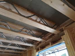 drilling holes in joists