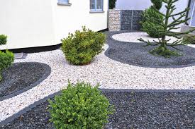 Try using white rocks to create a path from the sidewalk to your front door, or between flower beds and around to the backyard. How To Use Rocks In Your Landscape Design Stone Tree Landscaping St George Utah
