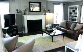 That said, experiment with floating the couch in the middle of the room, or at least try leaving a few inches between your wall show off the artwork in your living room with proper lighting. Black Gray Couch Large Size Living Walls Brown Grey Room Designs Pillows House N Decor