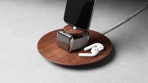 This docks allows you to look at notifications. Wooden Iphone And Apple Watch Charging Stand Yohann