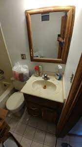 tiny bathroom or lose one bedroom by