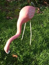 Pink Flamingo Eating Garden Ornaments