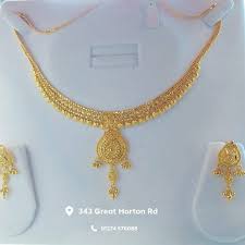 28 grams gold necklace with earrings