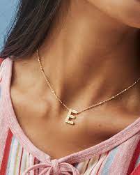 letter e pendant necklace in gold