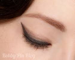winged cat eyeliner with fall colors