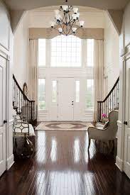 how to decorate a two story foyer