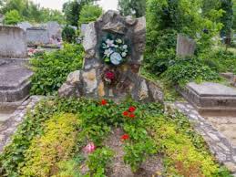 Plant Flowers In A Cemetery