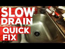 fix a slow draining kitchen sink diy