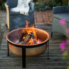 Simply remove the propane fire pit cover when ready to use on a cold summer night or to entertain guests in the winter. Copper Table Fire Pit Terrain