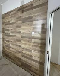 can you use laminate flooring on walls