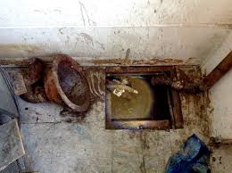 causes of sewer smell in house or