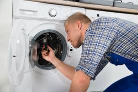 fix clogged washing machine drains
