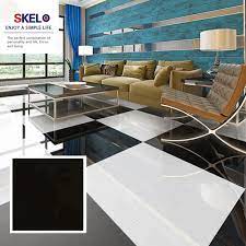 This living room features light gray walls and sparkling tiles flooring along with skylights. China Foshan Brand Name Living Room Flooring Tiles 600x600 Black Glazed Porcelain Floor Ceramic Tile Buy Black Porcelain Tile 600x600 Tile China Foshan Tiles Product On Alibaba Com