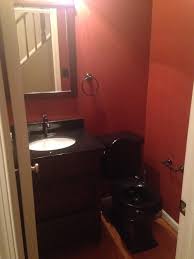 dark bathroom with black toilet help