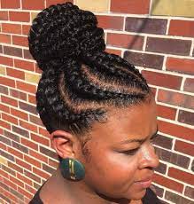 There are two loose braids at the front and the updo has been finished off with gold hair cuffs. Pin On Women Corn Row Up Do S