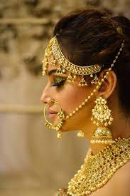 indian bride with yellow gold jewellery