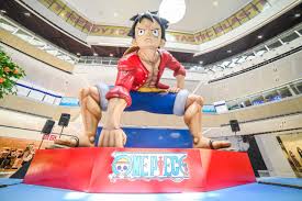 sm north edsa with a giant straw hat luffy