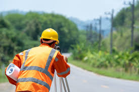 Premium Photo | Survey engineer in construction site use theodolite mark at  road.construction concept.