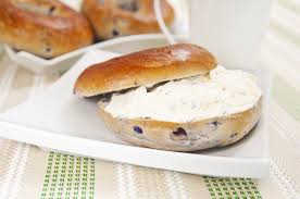 a blueberry bagel with cream cheese