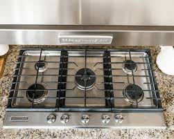how to clean a gas stove or cooktop