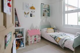 a mint girls bedroom with touches of