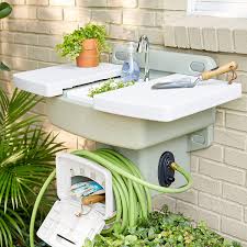 Easy to create, it will provide a convenient way to rinse off your garden harvest, fill a vase, or water a a portable and functional outdoor sink to be used for rinsing vegetables or washing hands outdoors. Amazon Com Brylanehome Outdoor Garden Sink With Hose Holder Reel Potting Station White Garden Outdoor