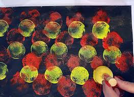 Vibrant Sponge Painting On Dark Paper