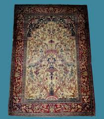 old isfahan rug in the form of a prayer