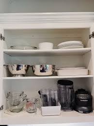 organize the inside of kitchen cabinets