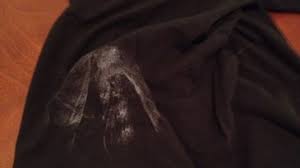 white spots on clothes after washing