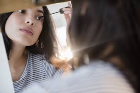 study says wearing makeup helps advance