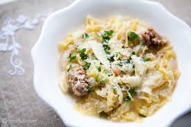 easy hearty and simple italian peasant stew with cabbage parsley and italian sausage