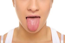 causes of white spots on your tongue
