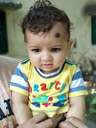 a cute one year old indian boy baby