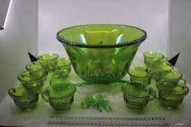 green carnival glass punch bowl set