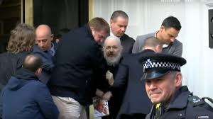 Julian Assange leaves Ecuadorian Embassy in London after six years - CNET